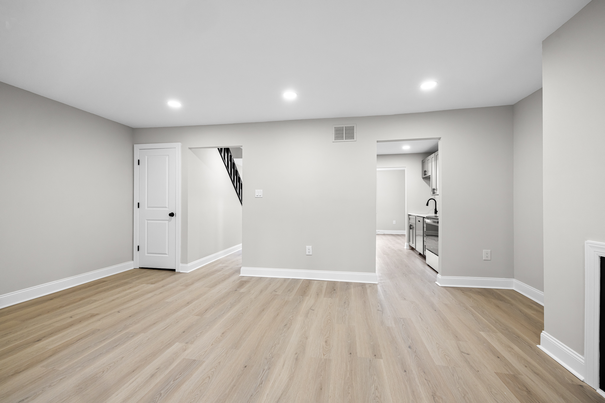 Spacious finished basement with recessed lighting