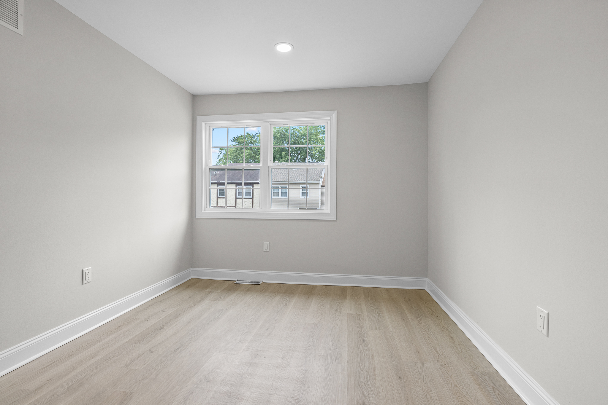 Updated bedroom with neutral paint palette