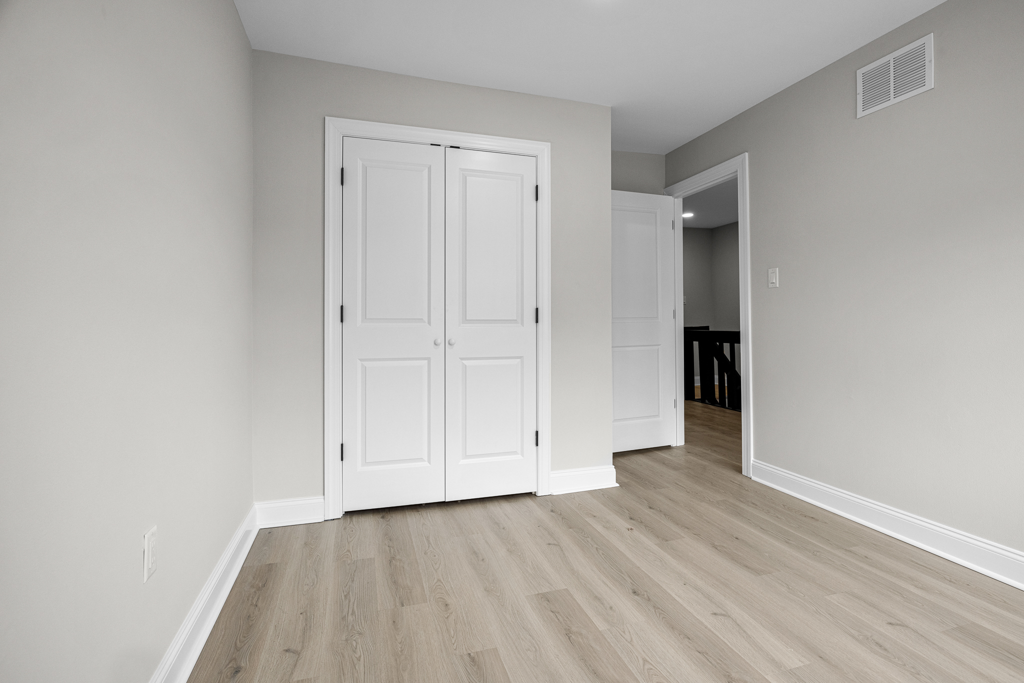Home remodel result with neutral palette and clean lines