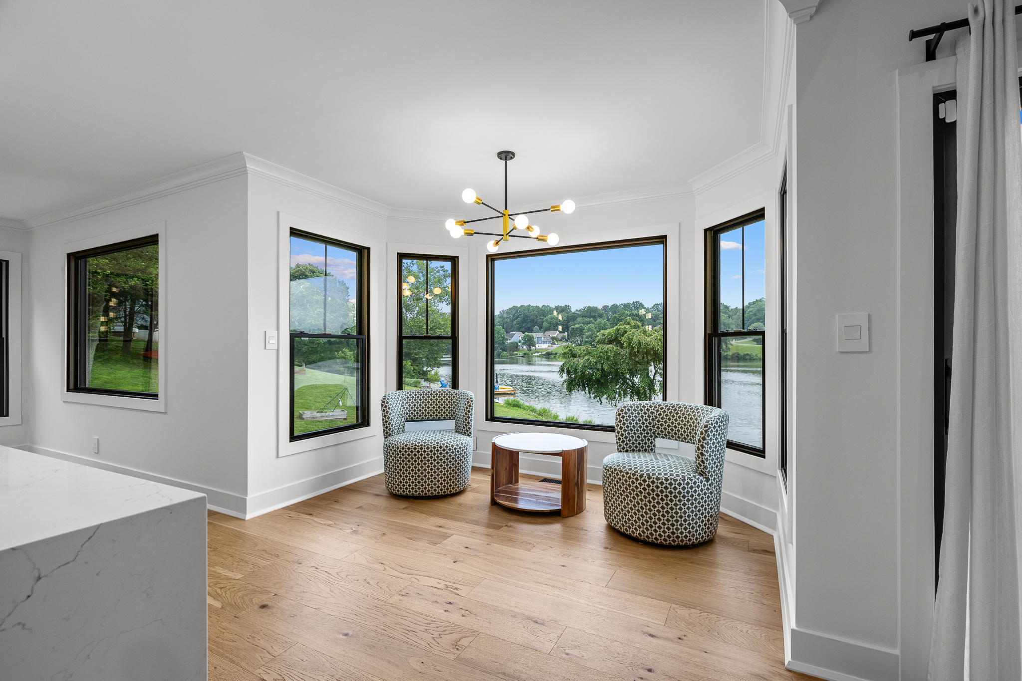 Completed renovation area with bright neutral palette